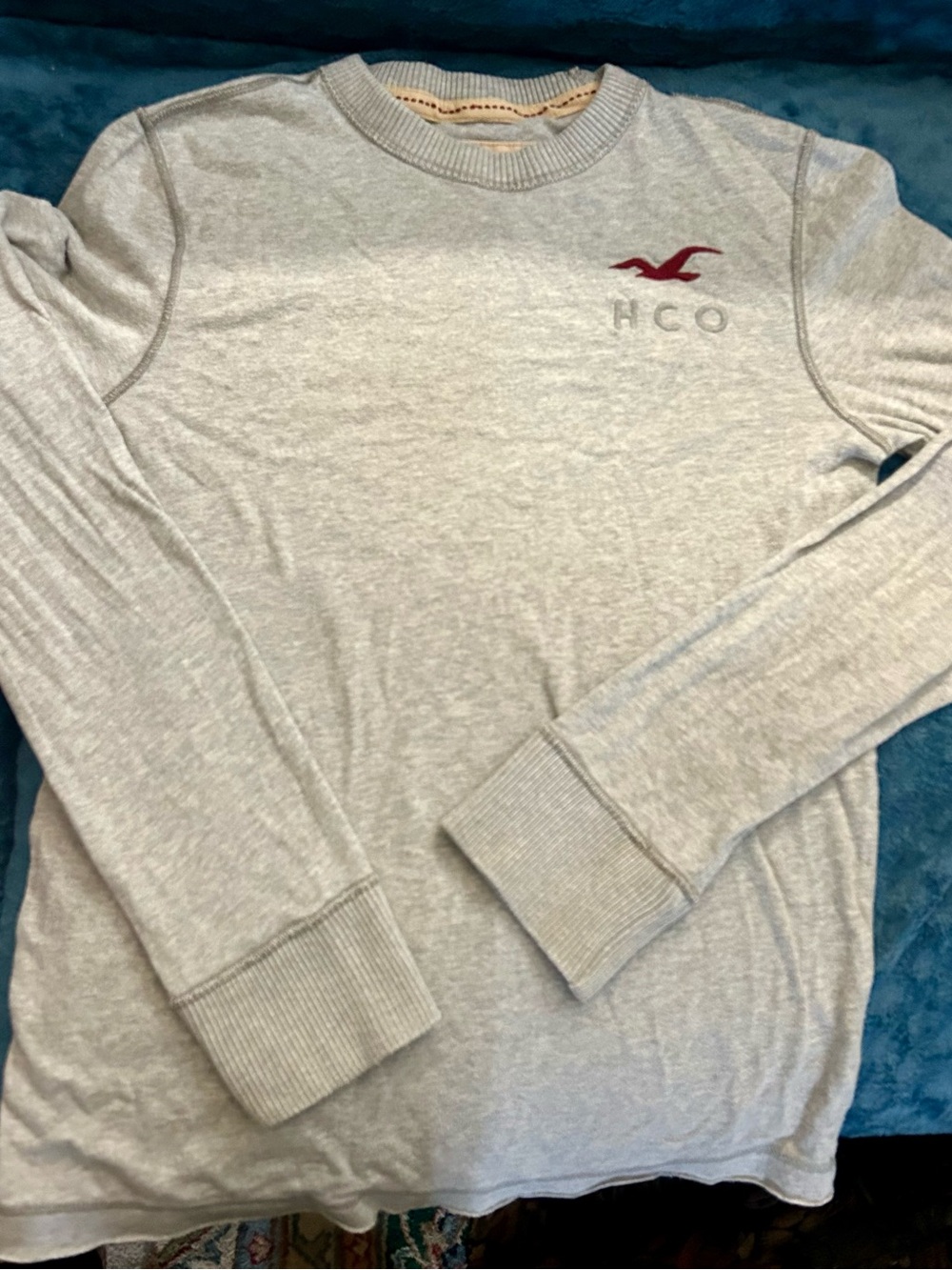 Hollister Light Gray Crewneck Sweatshirt with Red Logo